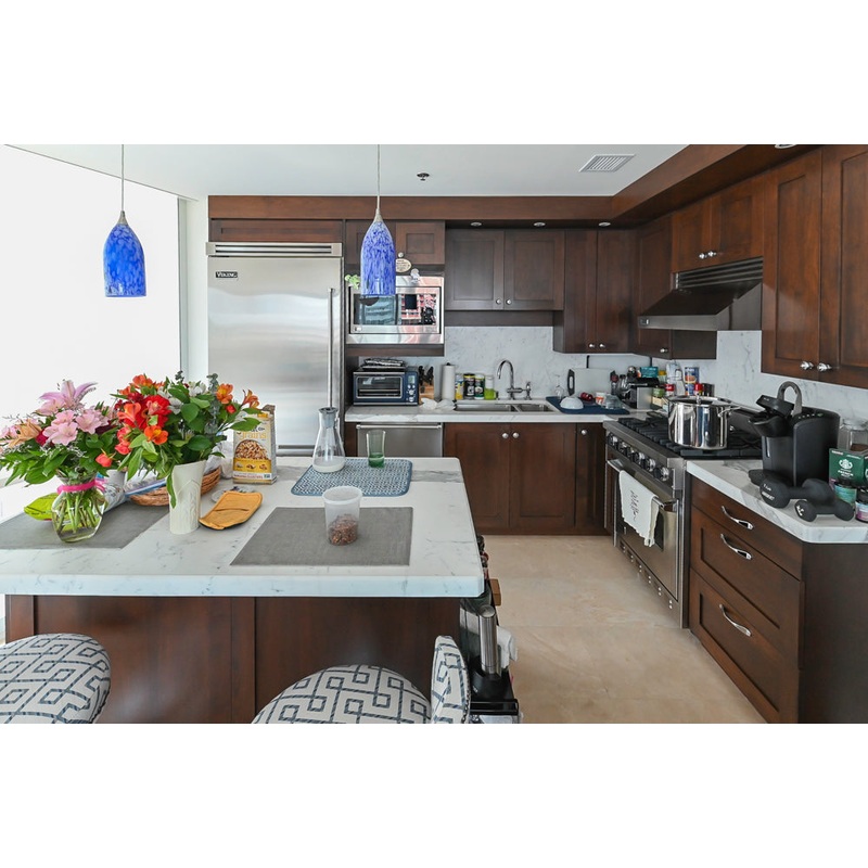 Dark Wooden Traditional Kitchen with Marble Island and Viking Appliance Package