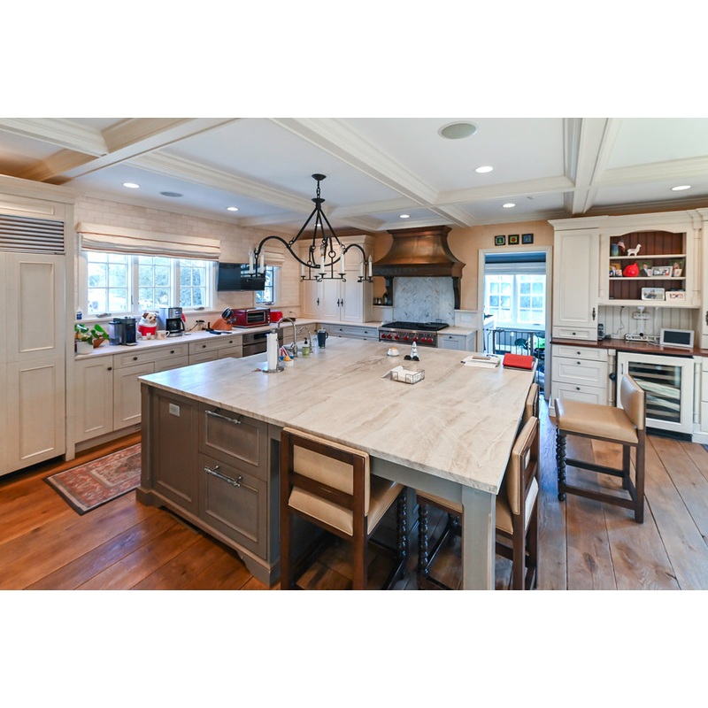 Wood-Mode Traditional Light Cream Kitchen with Marble Countertops and Wolf Range
