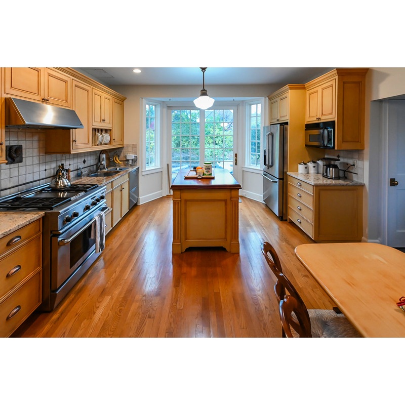 Traditional Light Brown Kitchen with Island, Appliances & Breakfast Area