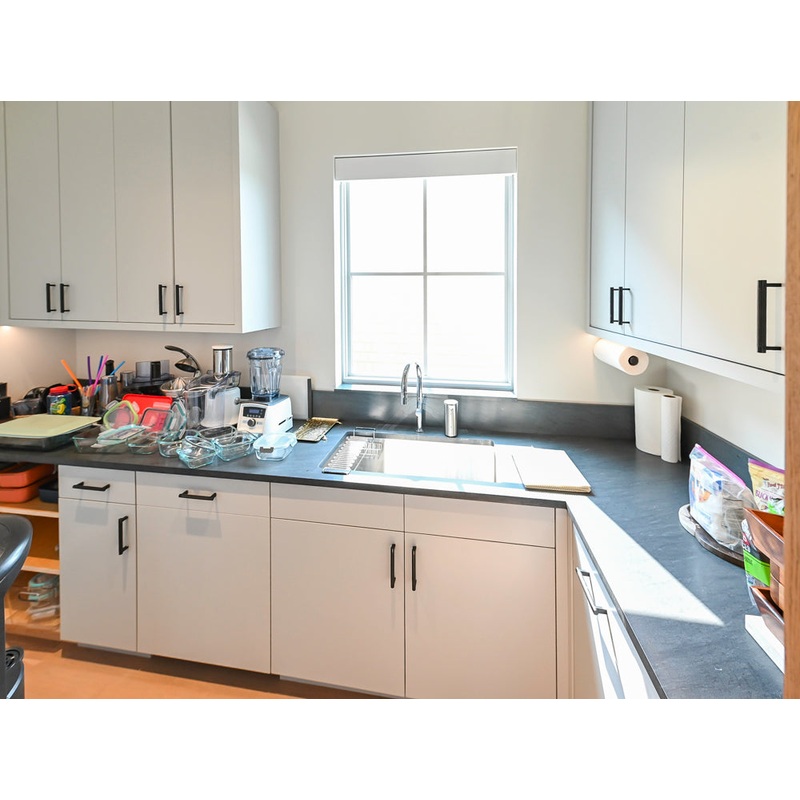 Custom Modern White Butler’s Pantry with Stone Countertops & Sink