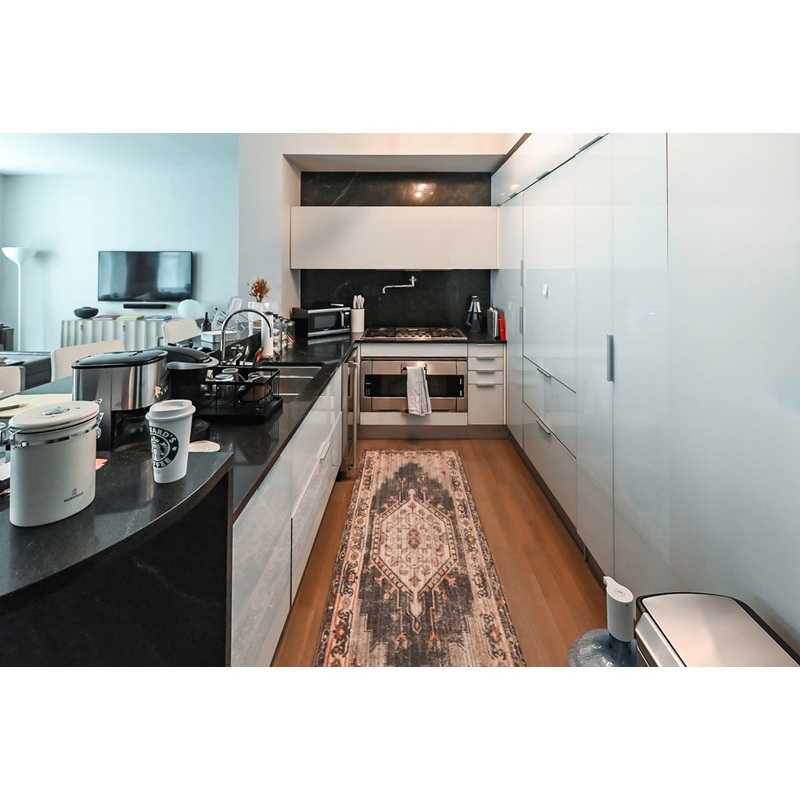Cesar Modern Glossy White Kitchen with Black Granite Countertops & Appliances