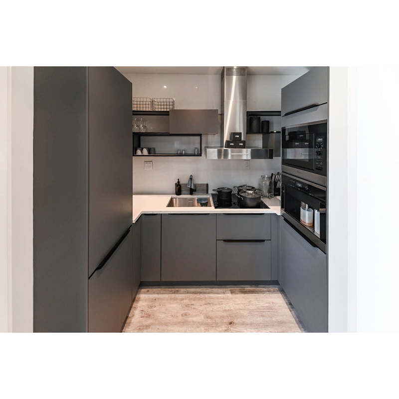 Modern Dark Grey Kitchenette with Quartz Countertops & Miele Appliances