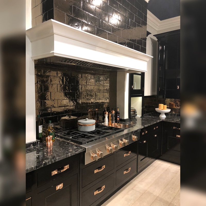 Christopher Peacock Culinarium Traditional Black Kitchen with Stone Countertops & JennAir Appliances