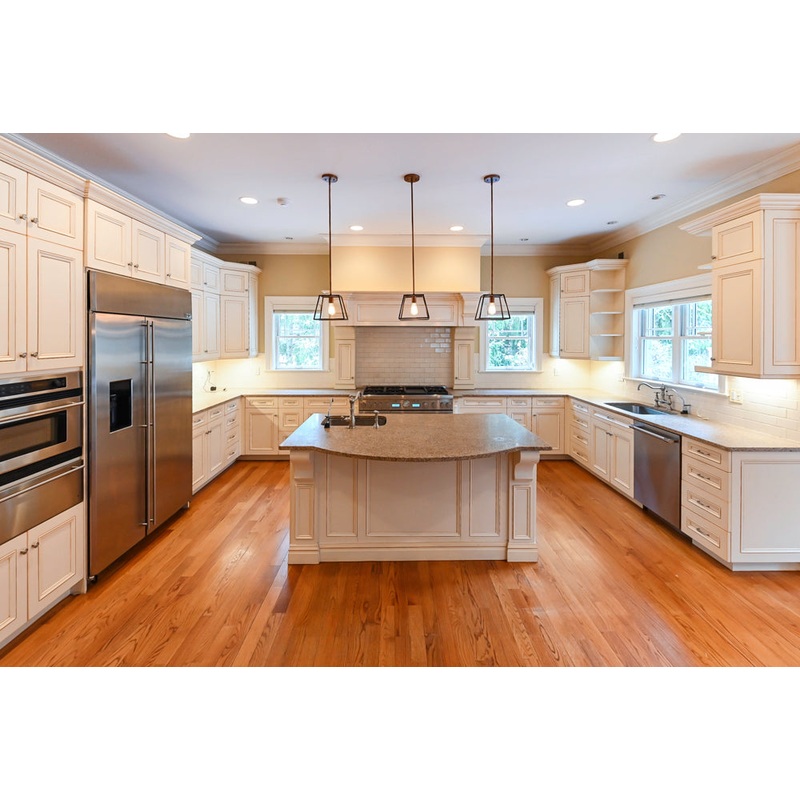 Traditional Cream Kitchen with Island, Granite Countertops & 48″ Thermador Range