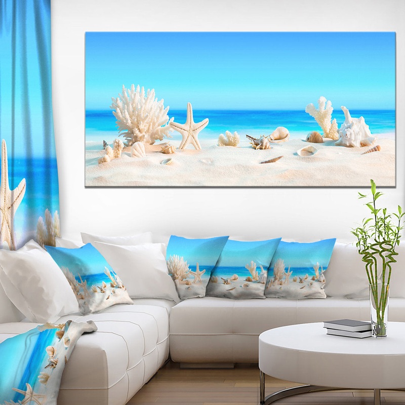 Risa Seashells on Tropical Beach’ Graphic Art Highland Dunes Size: 28″ H x 60″ W x 1.5″ D Format: Wrapped Canvas